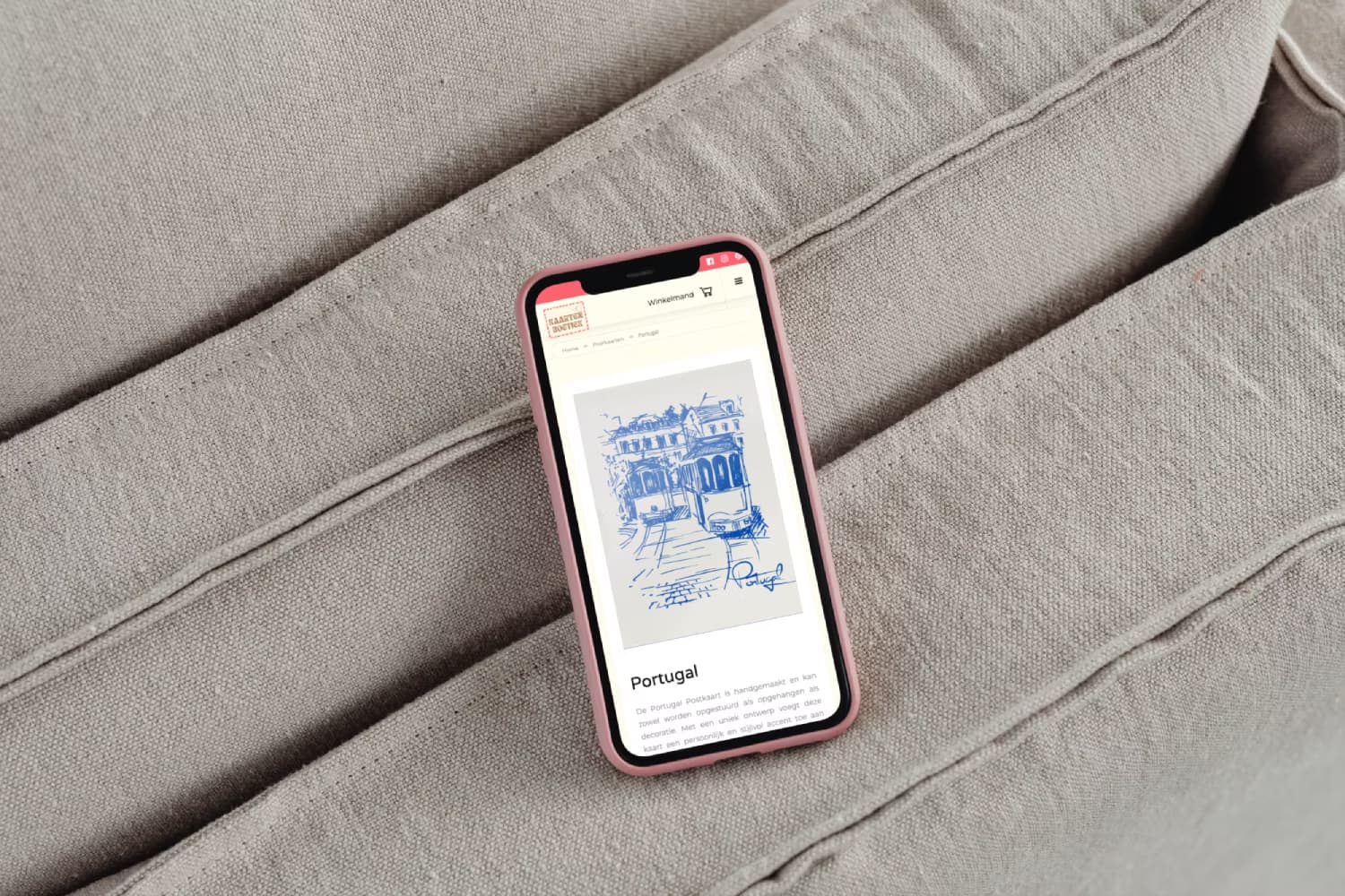 Een smartphone waar de Kaartenboetiek webshop zichtbaar is