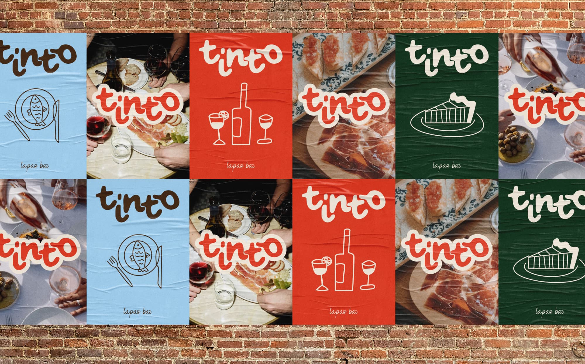 Op een muur hangen verschillende posters van tapasbar Tinto.